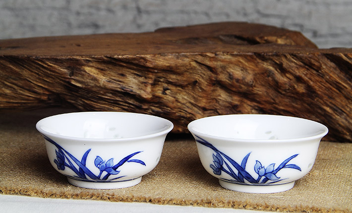 8头玲珑半刀泥青花时光茶具兰花-产品中心-景德镇陶瓷集团有限责任公司