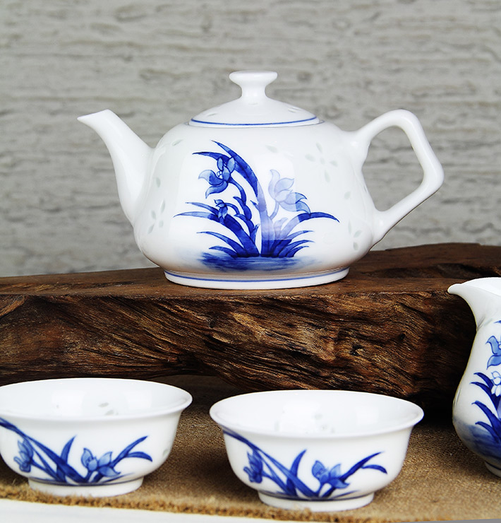 8头玲珑半刀泥青花时光茶具兰花-产品中心-景德镇陶瓷集团有限责任公司