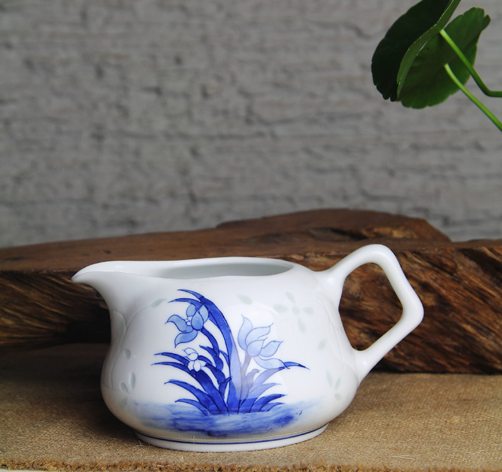8头玲珑半刀泥青花时光茶具兰花-产品中心-景德镇陶瓷集团有限责任公司